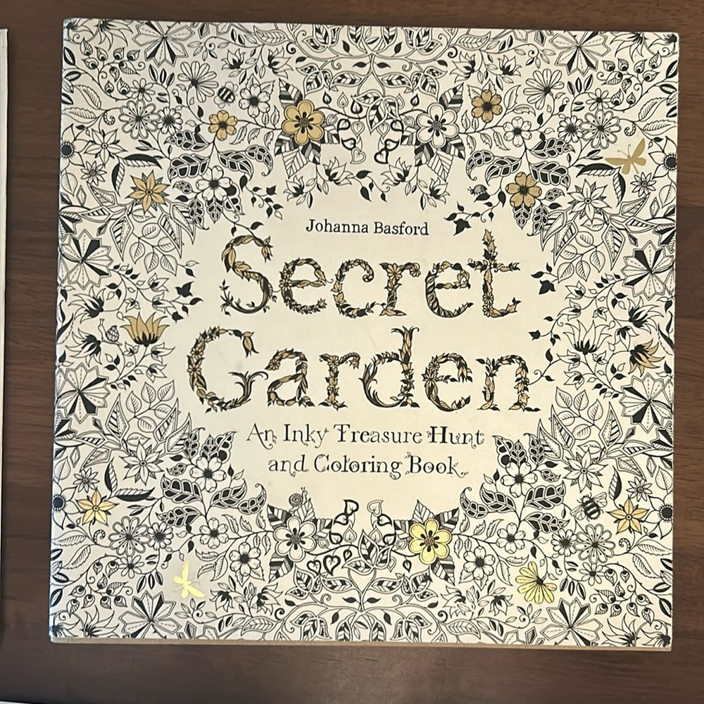 3 adult coloring books.